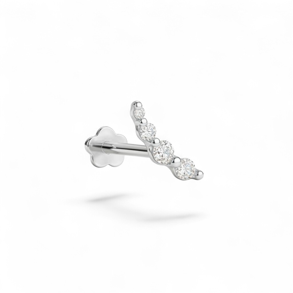 Petite 14K white gold curve CZ flatback earring featuring a gently curved row of stones. 