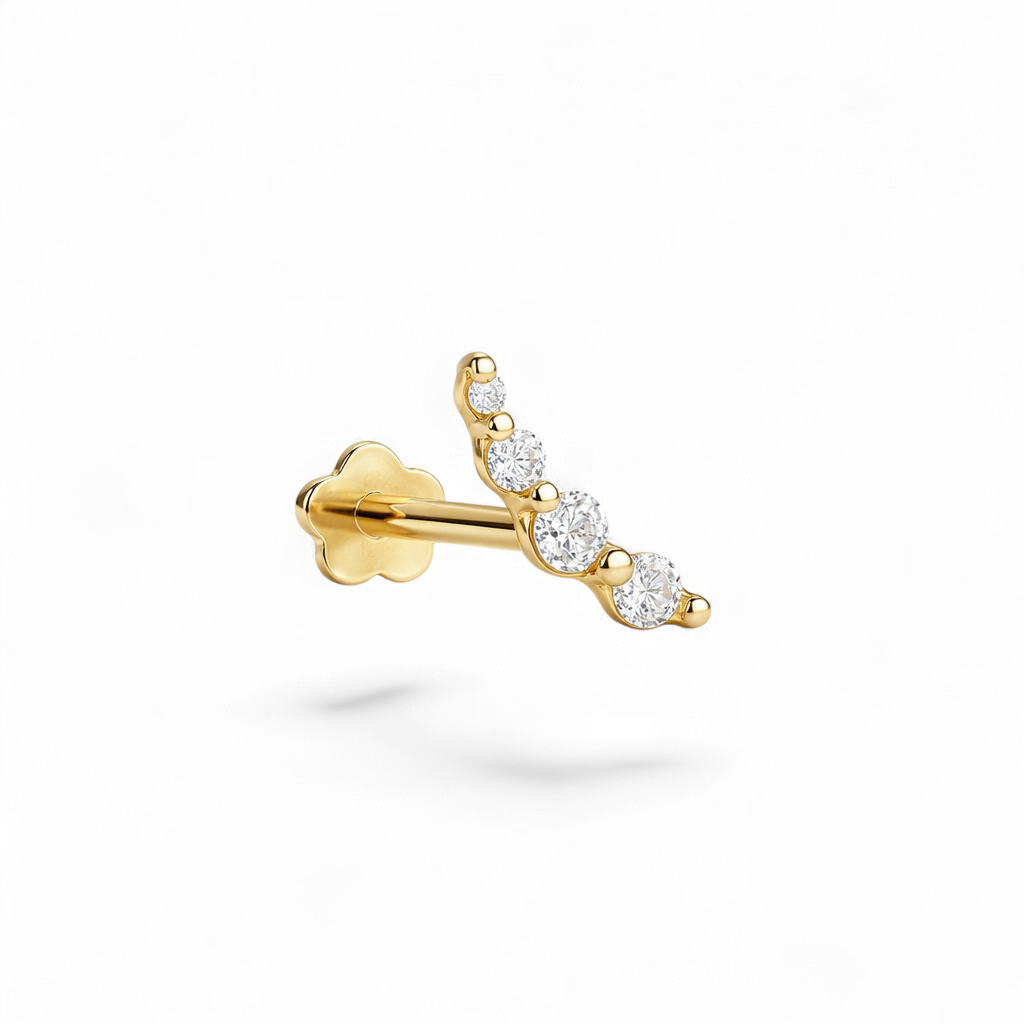 Petite 14K yellow gold curve CZ flatback earring featuring a gently curved row of stones. 