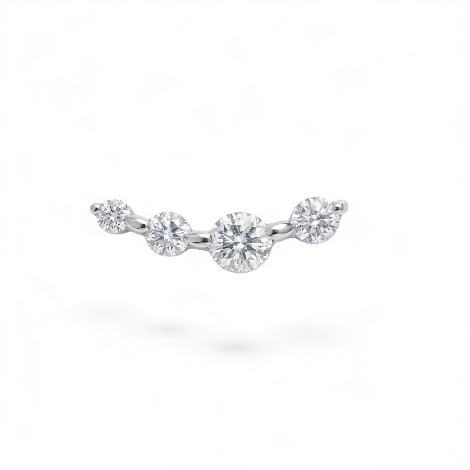 white gold CZ earring on a white background