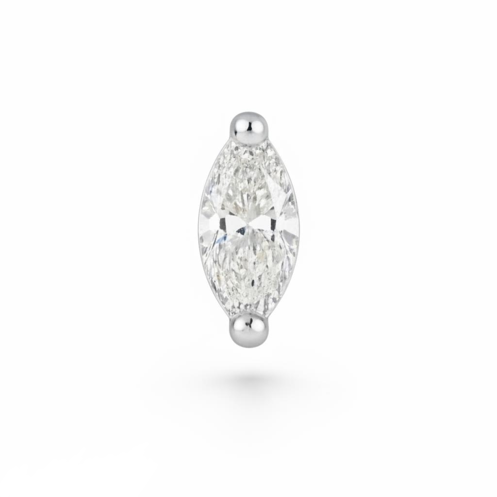 Marquise-shaped diamond earring on a white background