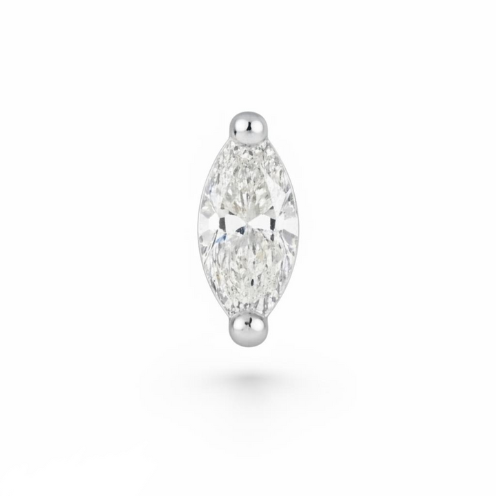 Marquise-shaped diamond earring on a white background