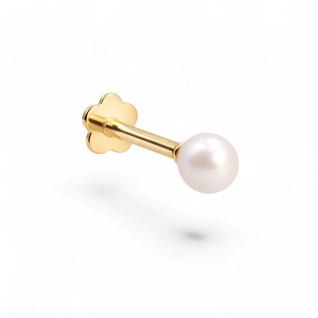 Petite 14K yellow gold baby pearl flatback earring featuring a delicate Swarovski glass pearl.