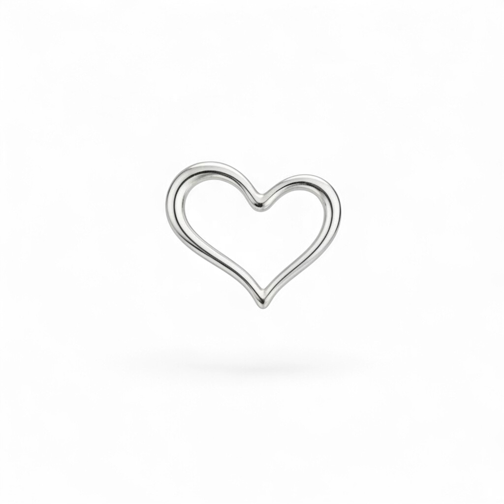 Silver heart-shaped ring on a white background