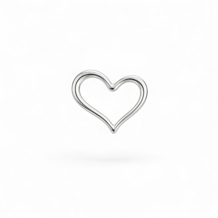 Silver heart-shaped ring on a white background