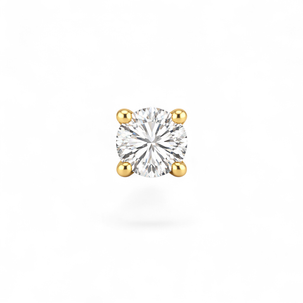 Single diamond earring with gold prongs on a white background